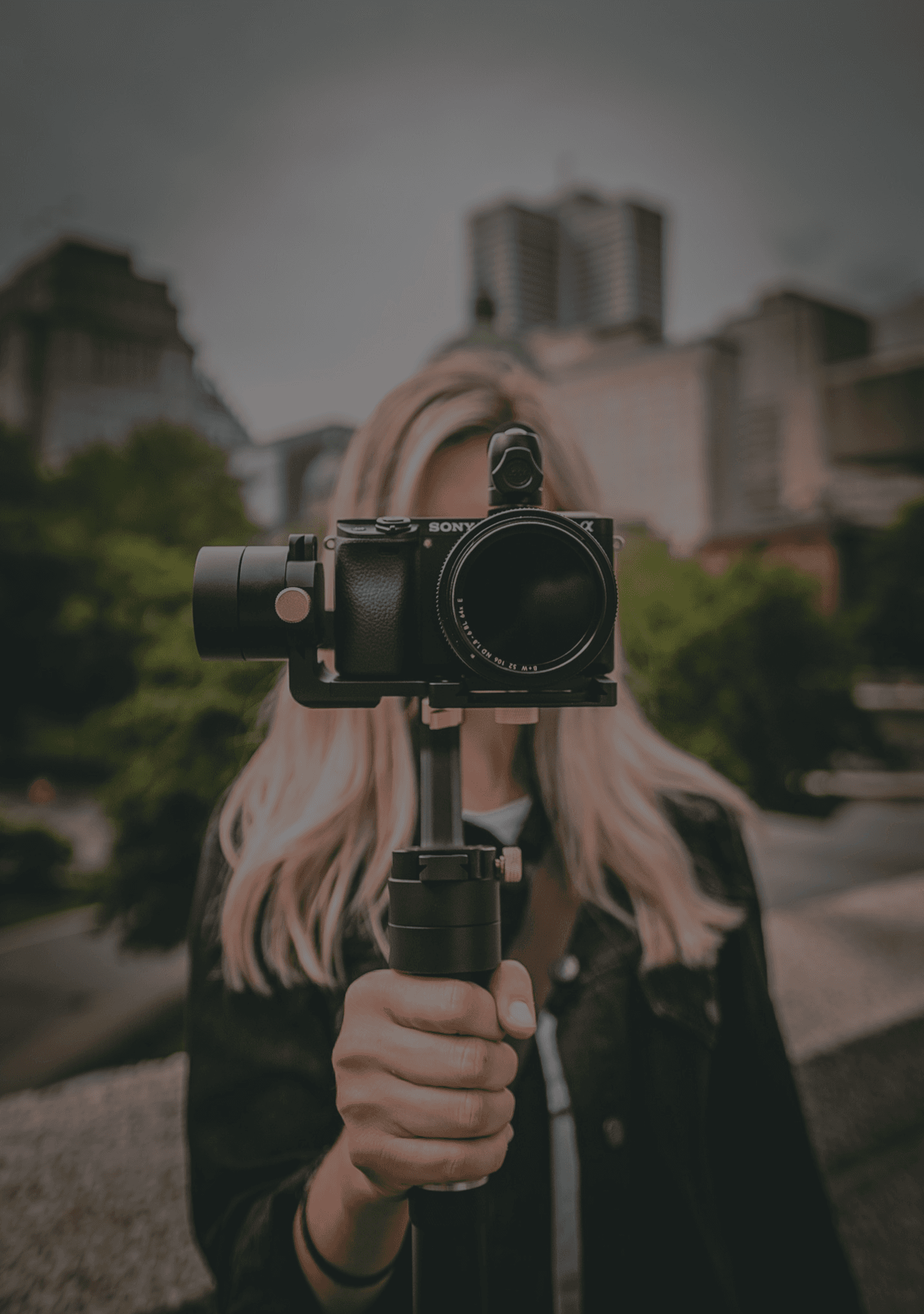 Creator holding camera